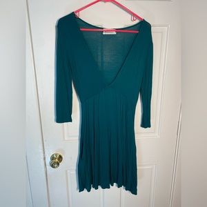 Urban Outfitters green mini dress deep v cut. Size M